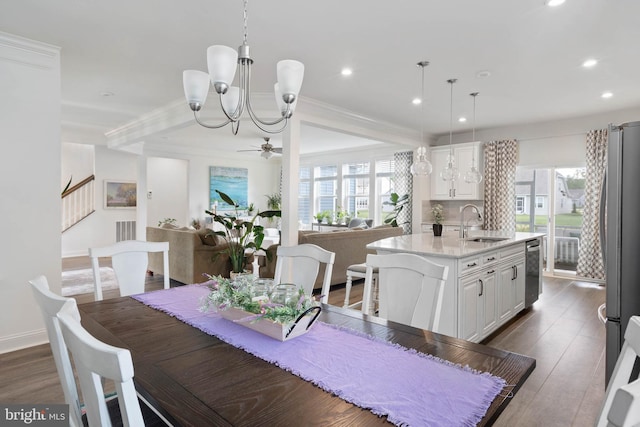 20093 Old Salt Ln, Frankford, DE 19945 - dining room with healthy amount of natural light, recessed lighting, a chandelier, dark wood finished floors, and ornamental molding