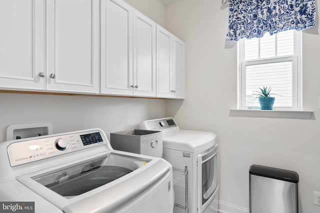 20093 Old Salt Ln, Frankford, DE 19945 - laundry room featuring washing machine and dryer and cabinet space