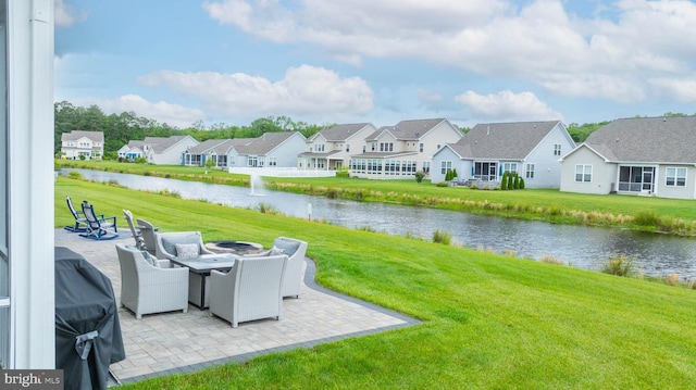 20093 Old Salt Ln, Frankford, DE 19945 - view of green lawn with a residential view, a patio area, a water view, and a fire pit