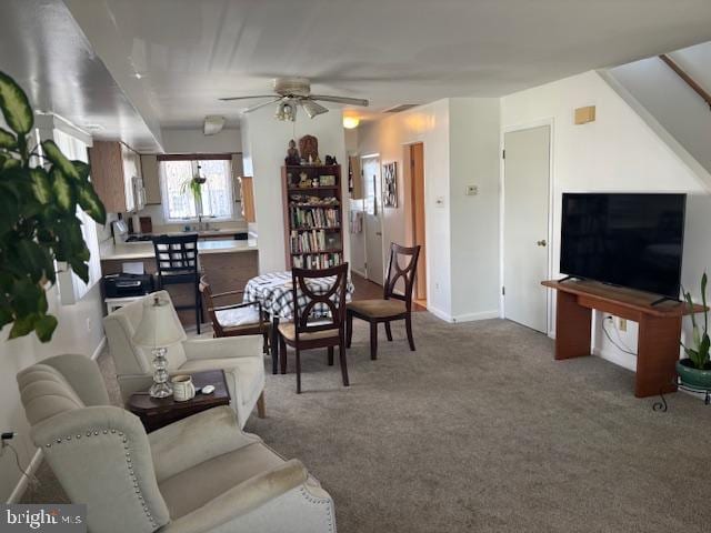 101 11th St N # A, Brigantine, NJ 08203 - carpeted living room with a ceiling fan and baseboards