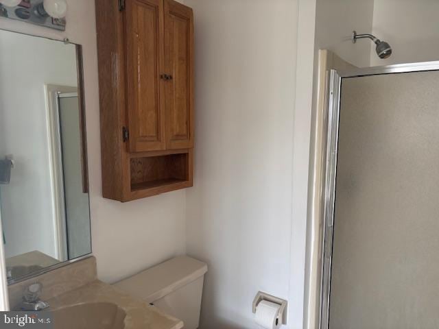 101 11th St N # A, Brigantine, NJ 08203 - bathroom with toilet, a stall shower, and vanity