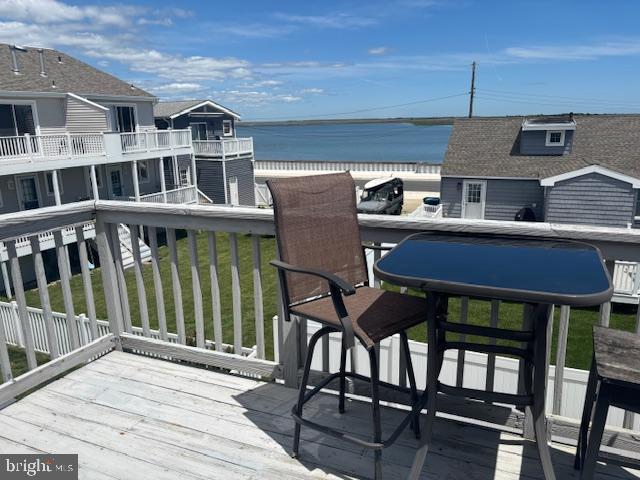 101 11th St N # A, Brigantine, NJ 08203 - wooden deck featuring a water view