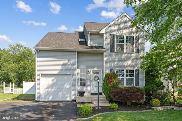 357 Bradford Ln, Lansdale, PA 19446 - traditional-style house featuring driveway, an attached garage, and roof with shingles