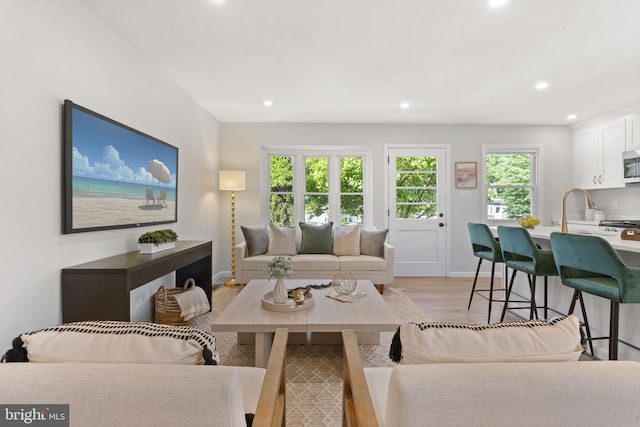 112 Morris Ave, Woodlyn, PA 19094 - living room featuring recessed lighting, light wood-style flooring, and baseboards
