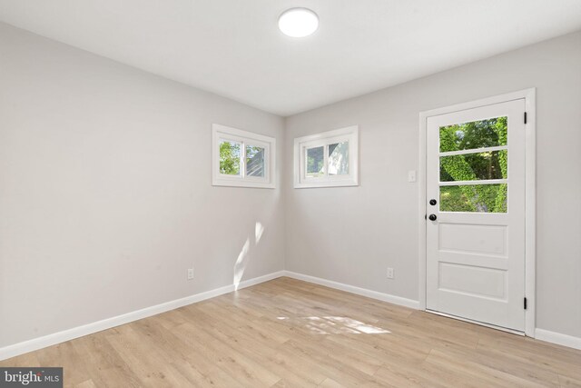 112 Morris Ave, Woodlyn, PA 19094 - empty room with plenty of natural light, baseboards, and light wood-style floors