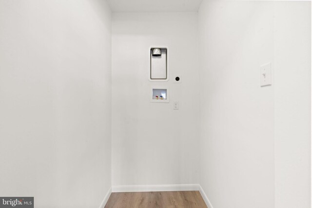 112 Morris Ave, Woodlyn, PA 19094 - laundry area with hookup for a washing machine, hookup for an electric dryer, baseboards, and light wood-type flooring