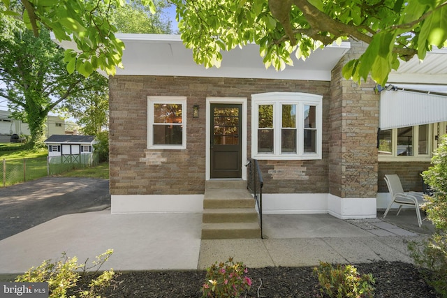 112 Morris Ave, Woodlyn, PA 19094 - doorway to property featuring stone siding and brick siding