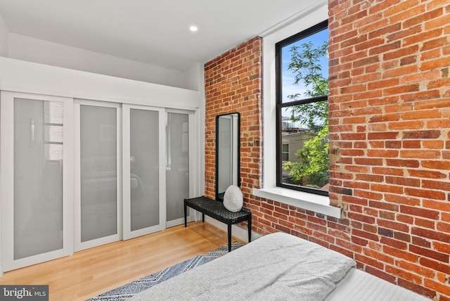 1615 Q St NW Unit 214, Washington, DC 20009 - bedroom featuring wood finished floors, recessed lighting, and a closet