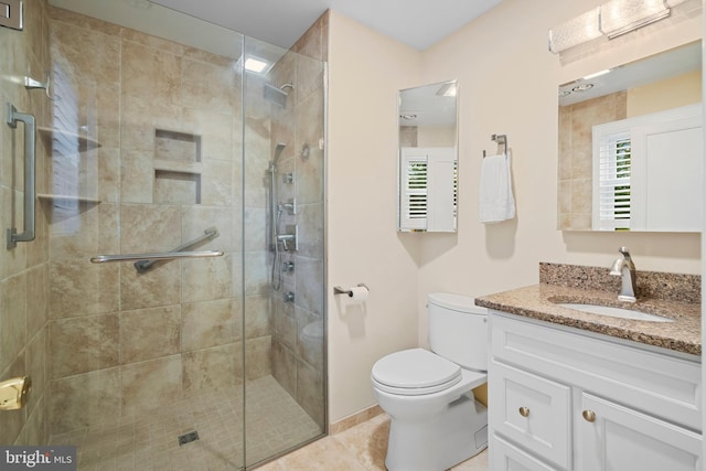 530 Anneslie Rd, Baltimore, MD 21212 - full bath with toilet, vanity, a shower stall, and tile patterned flooring