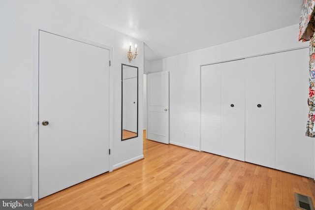 530 Anneslie Rd, Baltimore, MD 21212 - unfurnished bedroom with wood finished floors and a closet