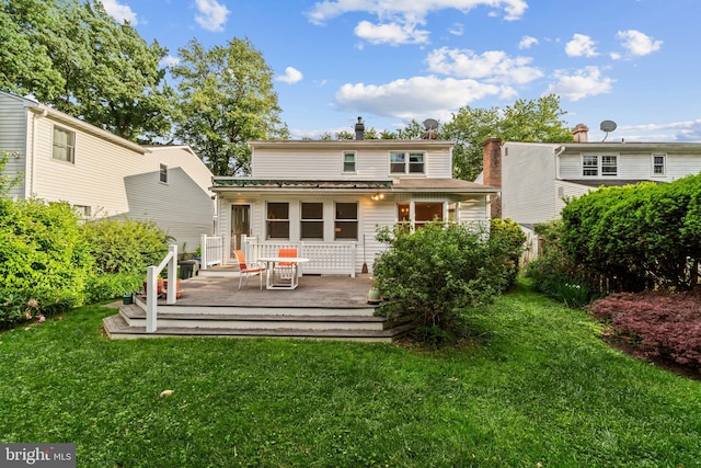 530 Anneslie Rd, Baltimore, MD 21212 - rear view of property featuring a lawn and a wooden deck