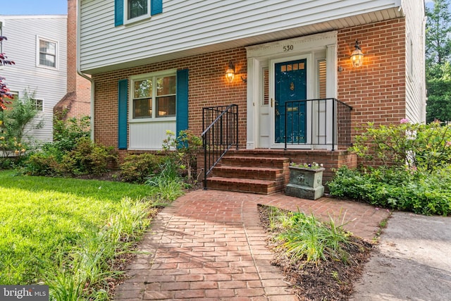 530 Anneslie Rd, Baltimore, MD 21212 - doorway to property with brick siding