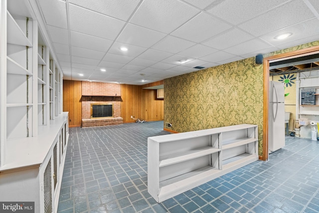 530 Anneslie Rd, Baltimore, MD 21212 - below grade area with freestanding refrigerator, a fireplace, a paneled ceiling, and recessed lighting