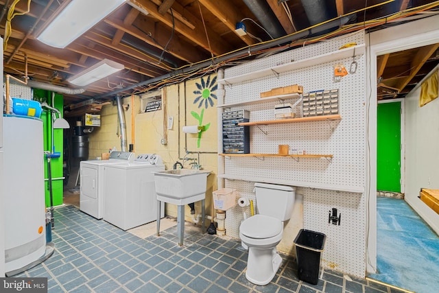 530 Anneslie Rd, Baltimore, MD 21212 - unfinished below grade area featuring washing machine and dryer and a sink