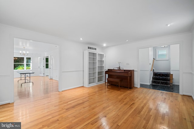 530 Anneslie Rd, Baltimore, MD 21212 - living area with stairway, ornamental molding, light wood-style floors, a chandelier, and recessed lighting