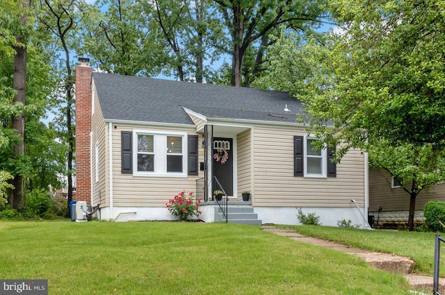 3302 Orlando Ave, Baltimore, MD 21234 - view of front of house with a chimney and a front yard