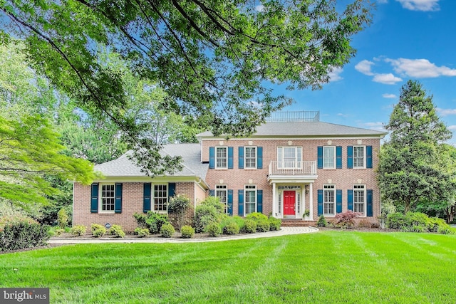 10106 Waterside Dr, Burke, VA 22015 - colonial home with brick siding and a front yard