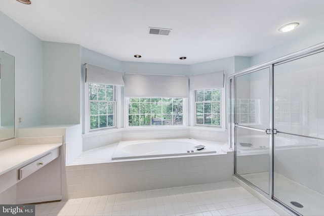 10106 Waterside Dr, Burke, VA 22015 - full bath with vanity, a bath, a stall shower, tile patterned floors, and recessed lighting