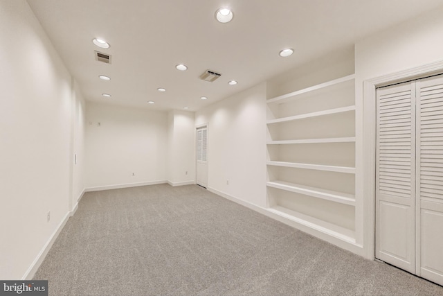 10106 Waterside Dr, Burke, VA 22015 - carpeted empty room with recessed lighting, baseboards, and built in shelves
