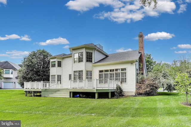 10106 Waterside Dr, Burke, VA 22015 - rear view of house featuring a wooden deck and a yard