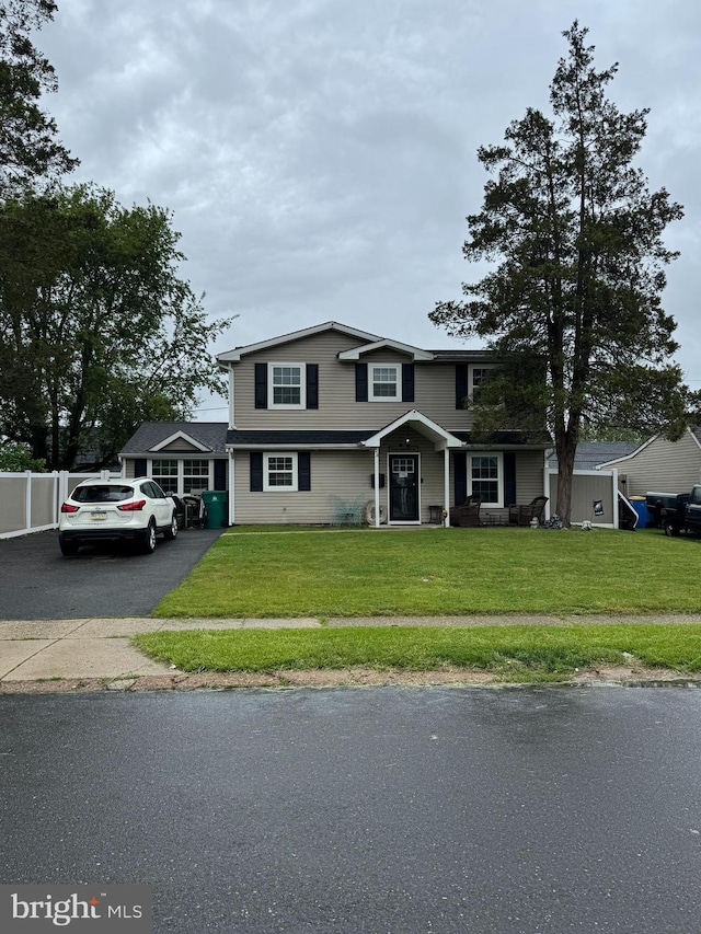 23 Winding Rd, Levittown, PA 19057 - traditional-style house with asphalt driveway