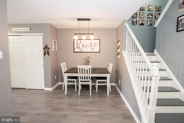 315 Dogwood St, Bally, PA 19503 - dining room with wood finished floors, baseboards, and stairway
