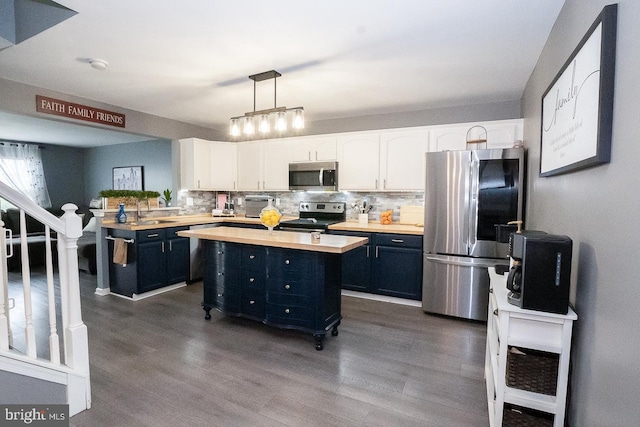 315 Dogwood St, Bally, PA 19503 - kitchen featuring appliances with stainless steel finishes, dark cabinets, white cabinetry, and a sink