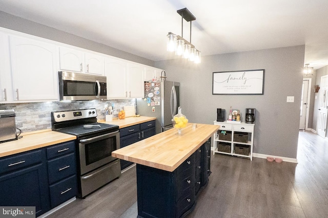 315 Dogwood St, Bally, PA 19503 - kitchen with appliances with stainless steel finishes, butcher block counters, and dark wood-type flooring