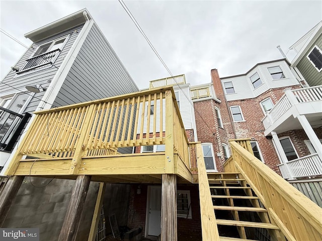 40 Bryant St NW, Washington, DC 20001 - back of house featuring stairway, brick siding, and a deck