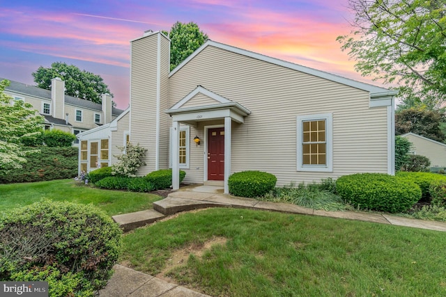 1201 Cambridge Ct, Palmyra, PA 17078 - view of front facade featuring a front yard and a chimney