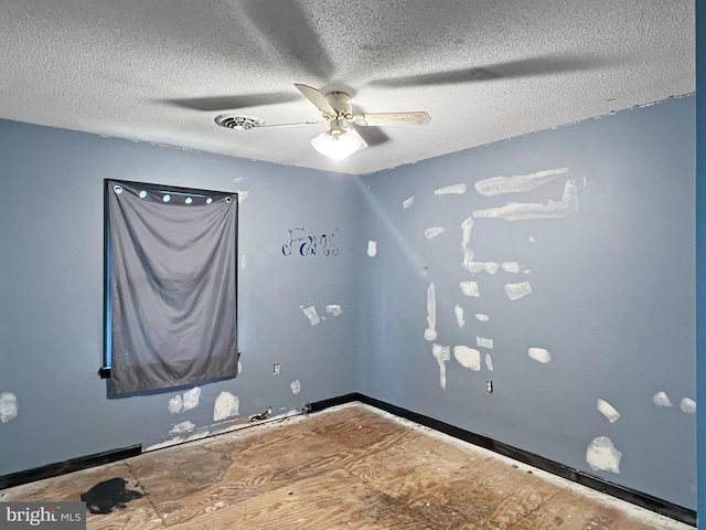 178 Fulton Ave, Charles Town, WV 25414 - empty room with a ceiling fan and a textured ceiling