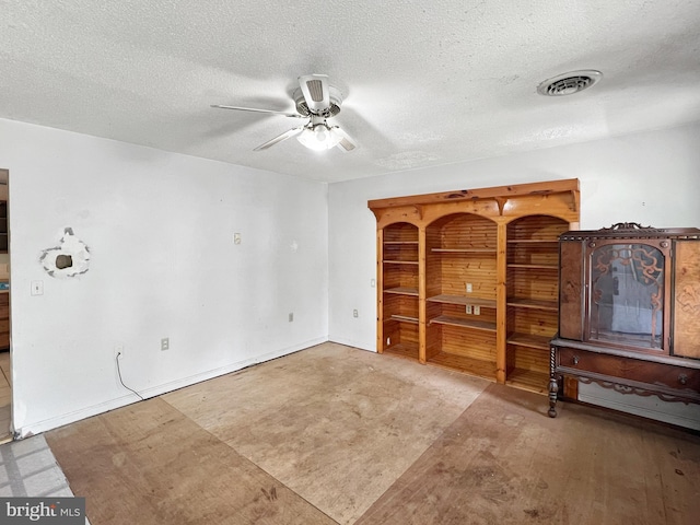 178 Fulton Ave, Charles Town, WV 25414 - unfurnished living room with ceiling fan and a textured ceiling