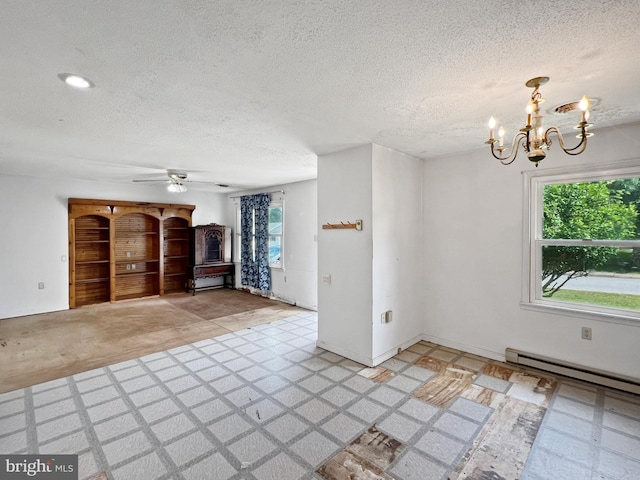 178 Fulton Ave, Charles Town, WV 25414 - unfurnished living room with a textured ceiling, a chandelier, plenty of natural light, ceiling fan, and a baseboard heating unit
