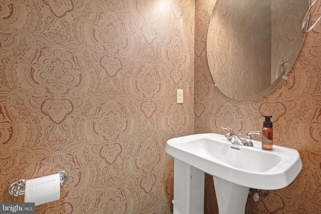 66 Farmview Ln, Lititz, PA 17543 - bathroom with wallpapered walls and a sink