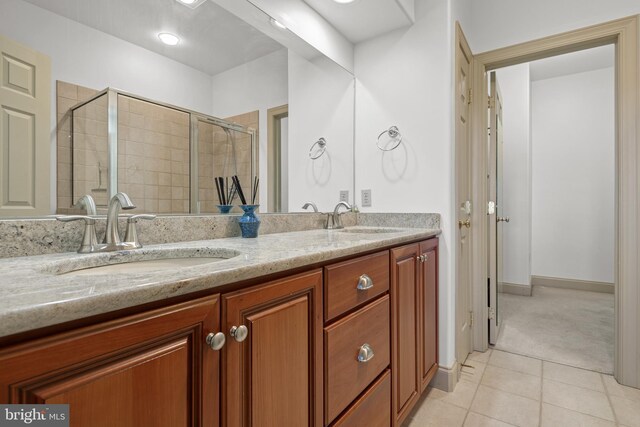 66 Farmview Ln, Lititz, PA 17543 - full bathroom featuring double vanity, tile patterned floors, and a stall shower