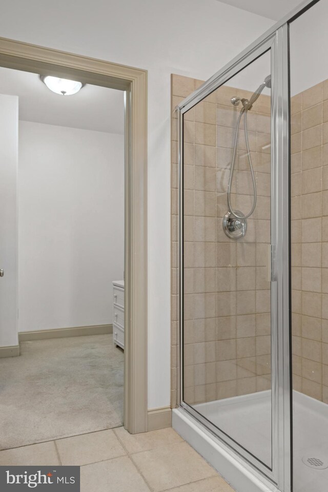 66 Farmview Ln, Lititz, PA 17543 - full bathroom with a shower stall, baseboards, and tile patterned floors