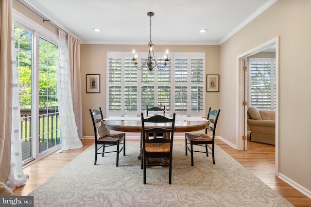285 Cherry Ln, Kennett Square, PA 19348 - dining area featuring a chandelier, crown molding, wood finished floors, baseboards, and recessed lighting