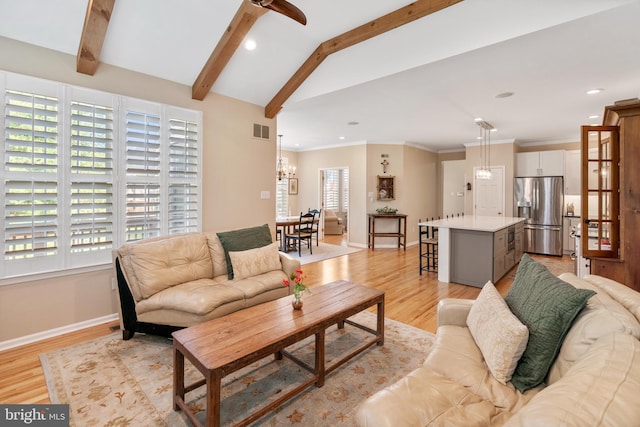 285 Cherry Ln, Kennett Square, PA 19348 - living room with light wood-style floors, baseboards, recessed lighting, ceiling fan, and a chandelier