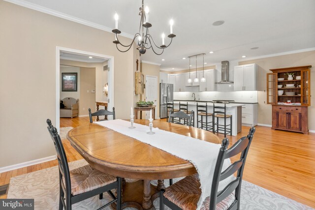 285 Cherry Ln, Kennett Square, PA 19348 - dining space featuring ornamental molding, light wood-type flooring, baseboards, a chandelier, and recessed lighting