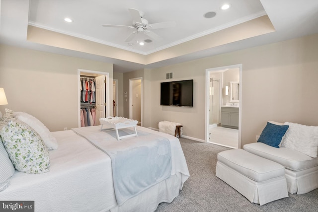 285 Cherry Ln, Kennett Square, PA 19348 - bedroom with carpet flooring, crown molding, a walk in closet, recessed lighting, and a tray ceiling