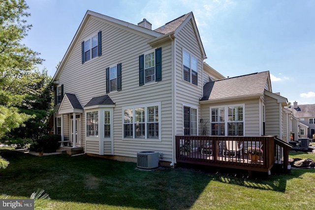 285 Cherry Ln, Kennett Square, PA 19348 - rear view of property featuring a yard, a wooden deck, and central AC
