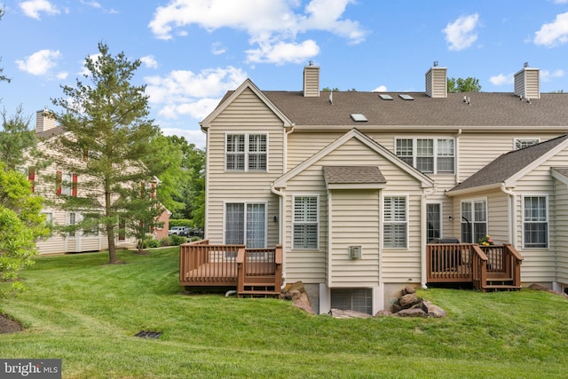 285 Cherry Ln, Kennett Square, PA 19348 - rear view of house featuring a deck and a lawn