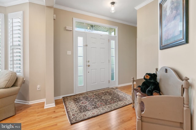 285 Cherry Ln, Kennett Square, PA 19348 - entrance foyer featuring light wood-style flooring, crown molding, and baseboards