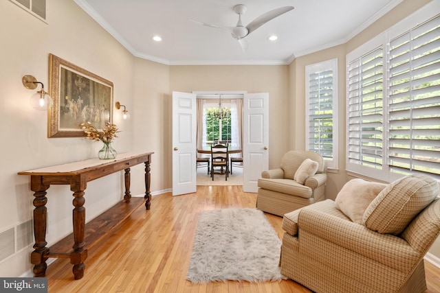 285 Cherry Ln, Kennett Square, PA 19348 - living room featuring ceiling fan, light wood-style floors, crown molding, recessed lighting, and baseboards