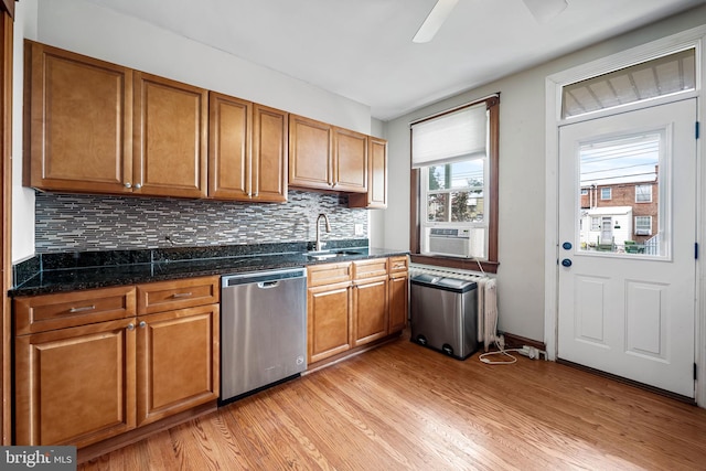 434 Elrino St, Baltimore, MD 21224 - kitchen with dishwasher, light wood-style flooring, brown cabinetry, decorative backsplash, and a ceiling fan