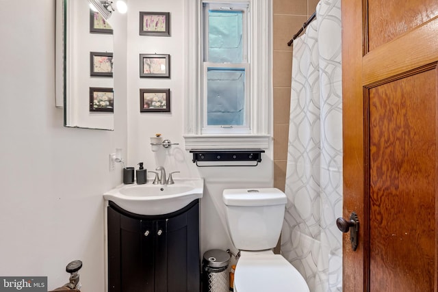 434 Elrino St, Baltimore, MD 21224 - full bath with vanity, toilet, and a shower with curtain