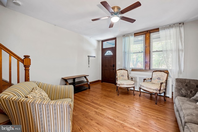 434 Elrino St, Baltimore, MD 21224 - entrance foyer featuring light wood-style flooring, ceiling fan, and stairs