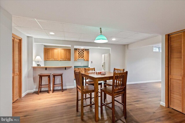 10 Evans Ln, Lawrenceville, NJ 08648 - dining area with a paneled ceiling, wood finished floors, baseboards, and recessed lighting
