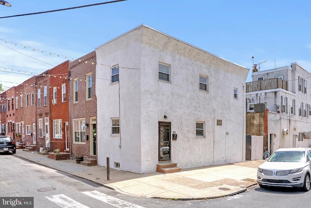 154 Mercy St, Philadelphia, PA 19148 - view of building exterior with entry steps and central AC unit
