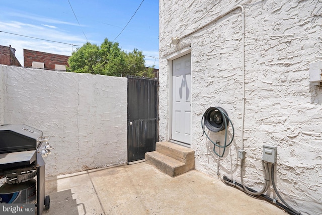 154 Mercy St, Philadelphia, PA 19148 - view of patio featuring a grill, a gate, and entry steps